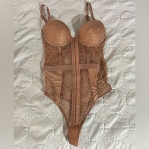 Nude lace thong bodysuit